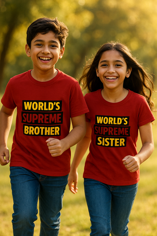 Two children wearing red t-shirts with humorous text in a natural setting